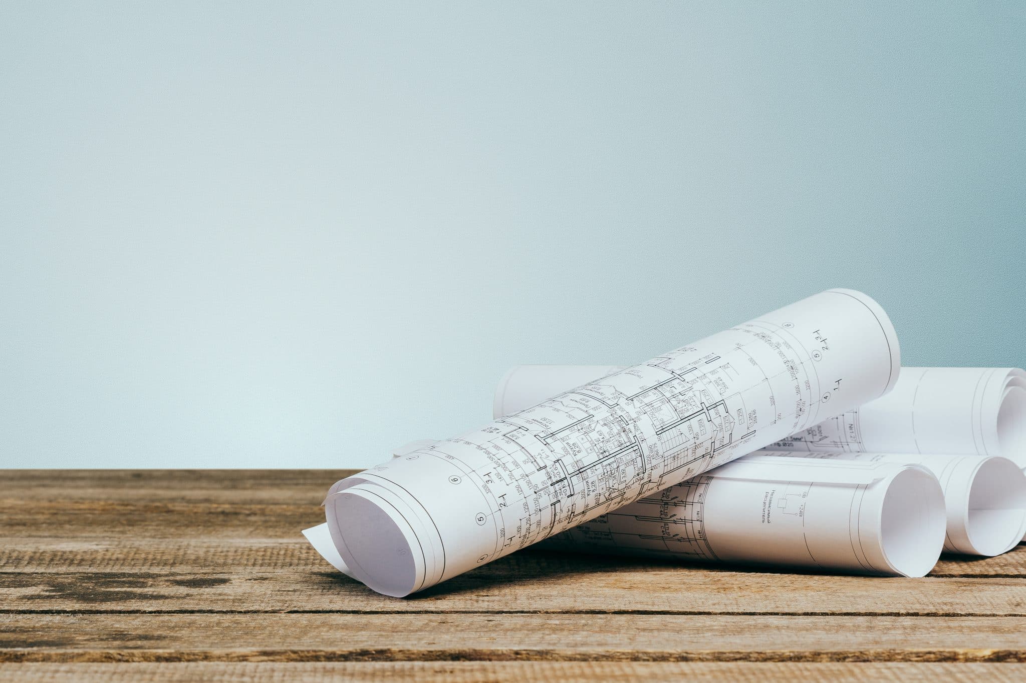 Architectural blueprints on a table close up